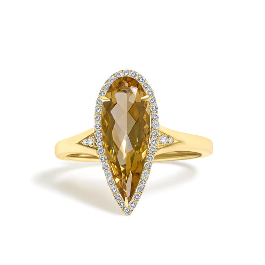 Front view of 10K yellow gold pear citrine geometric ring with 1/6 cttw diamond halo on white background
