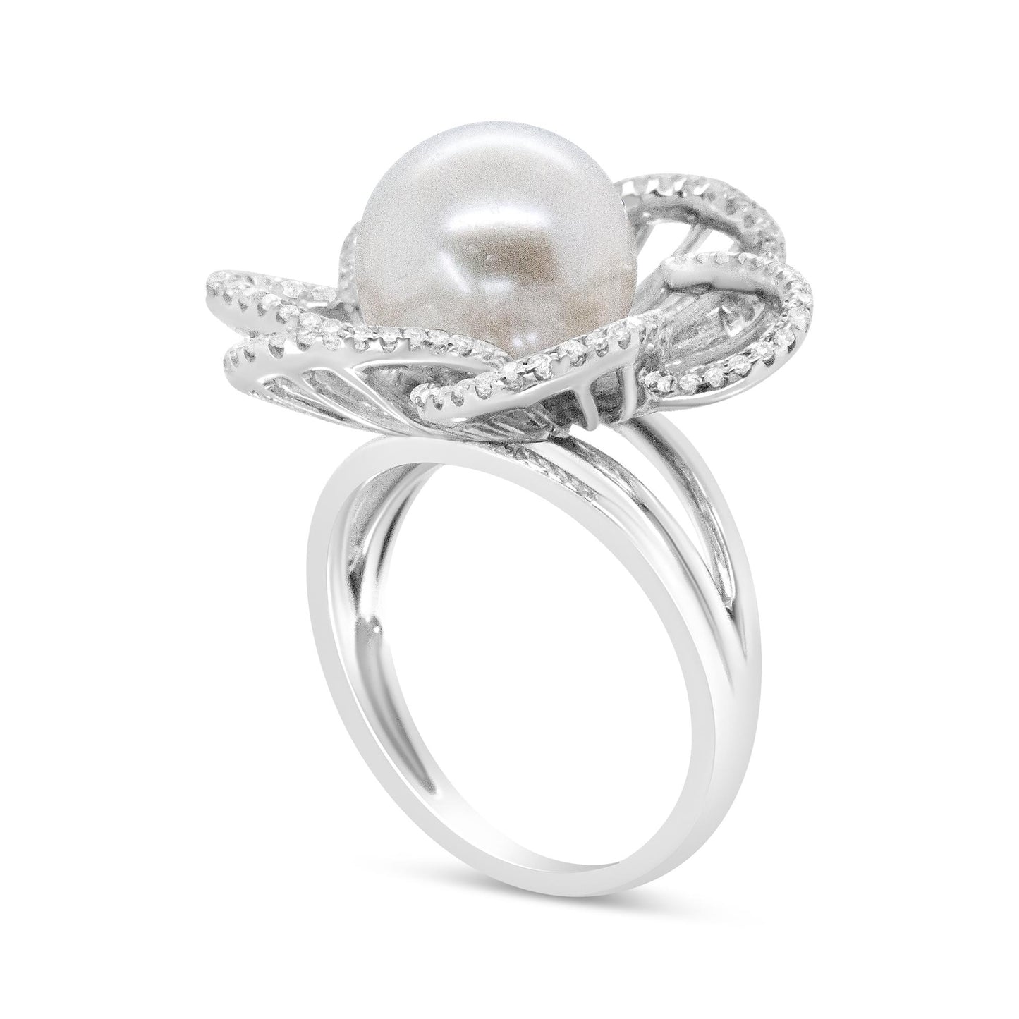 White metal ring angled to show side and top view, featuring a large central pearl surrounded by a flower-shaped design lined with small white gemstones in pave setting.