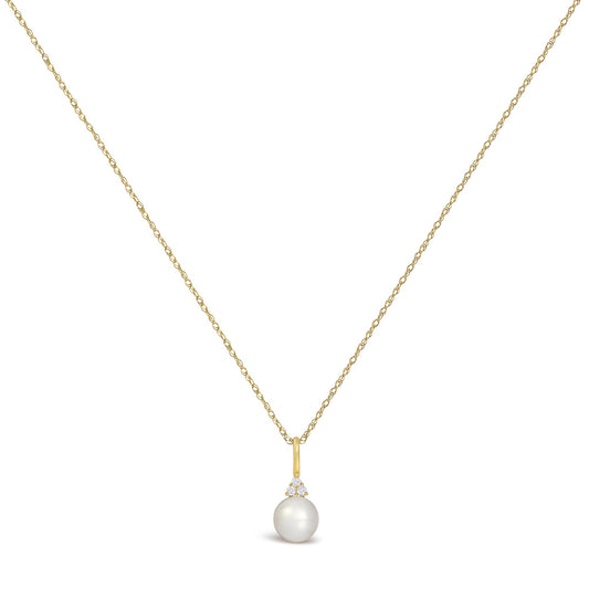 Front view of 10K yellow gold oval birthstone drop pendant necklace showcasing trio diamond accents on white background