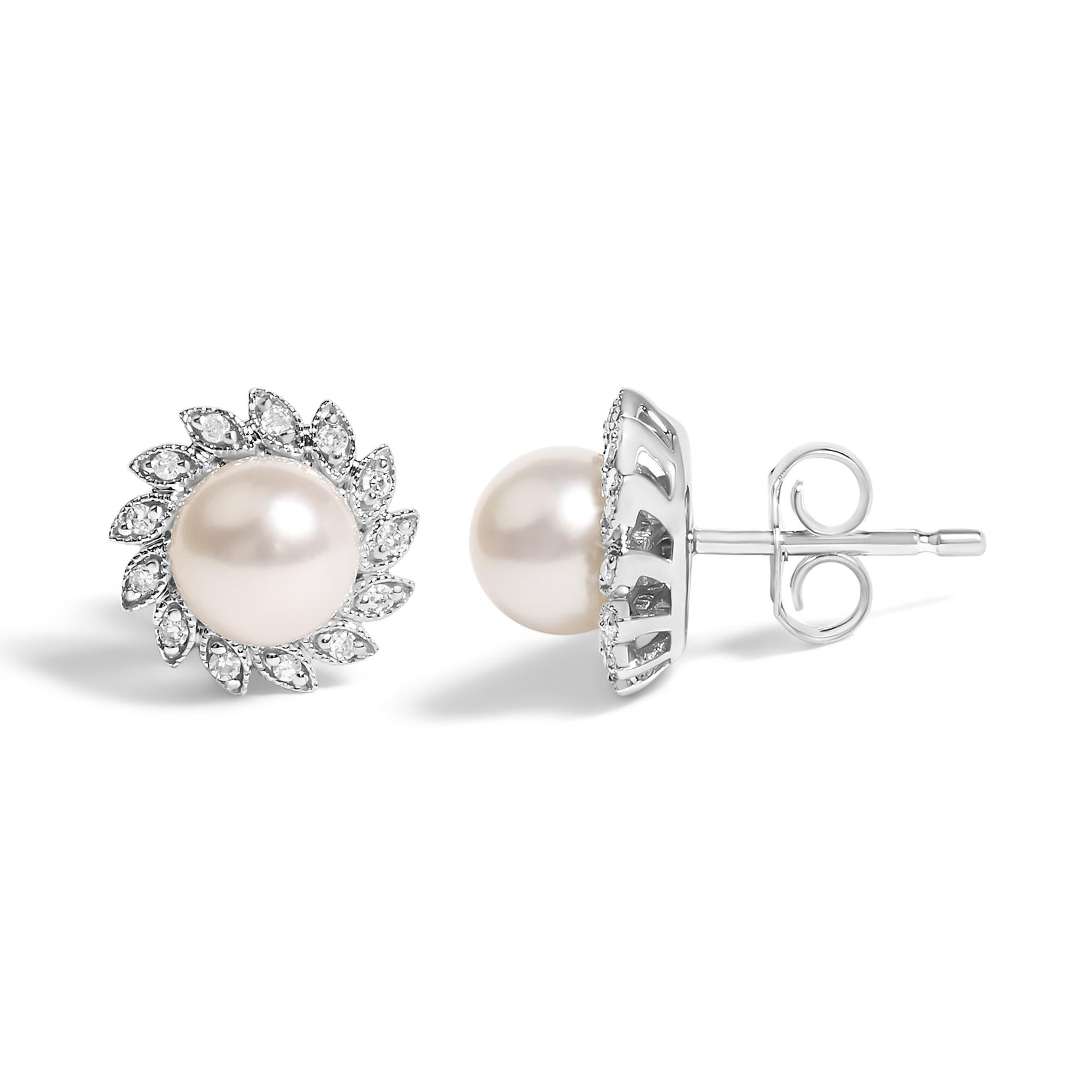 Close-up front and side angle view of a pair of white metal stud earrings with a central round pearl surrounded by white gemstones in a decorative pattern, shown on a white background.