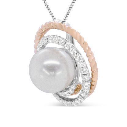 Close-up front angle of a necklace pendant featuring a large round pearl surrounded by intertwined white and rose metal loops, with one white metal loop adorned with round white gemstones in a pave setting.
