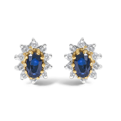Pair of yellow metal earrings with oval blue gemstones surrounded by round white gemstones, shown from a front angle on a white background.
