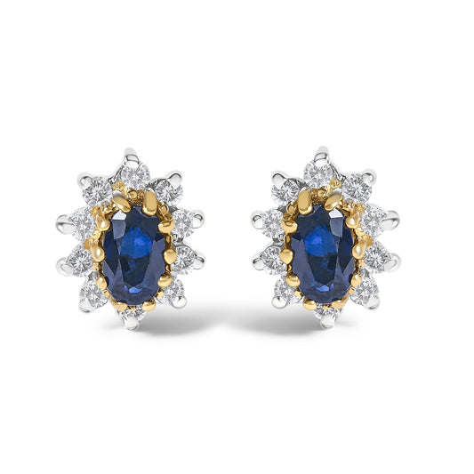 Pair of yellow metal earrings with oval blue gemstones surrounded by round white gemstones, shown from a front angle on a white background.