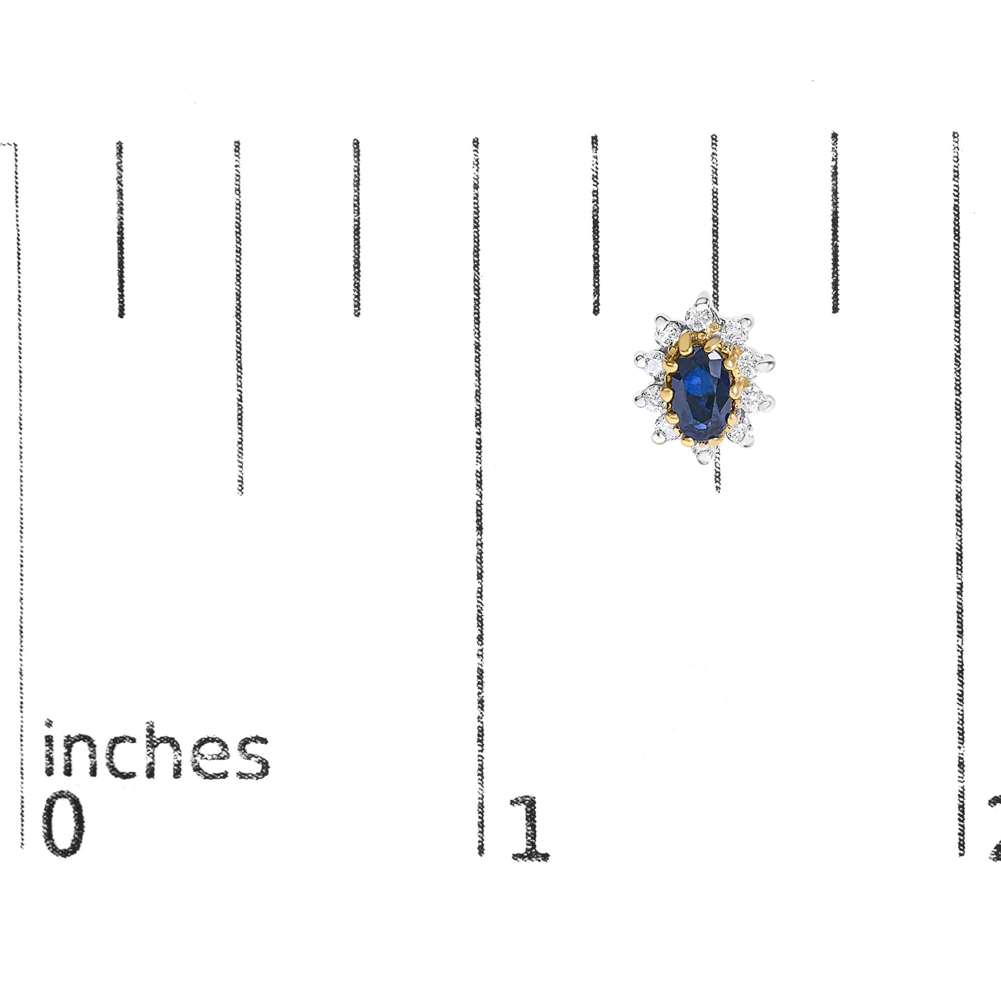 Close-up image of a yellow metal earring with an oval blue gemstone center surrounded by round white gemstones in prong settings, shown on a scale.