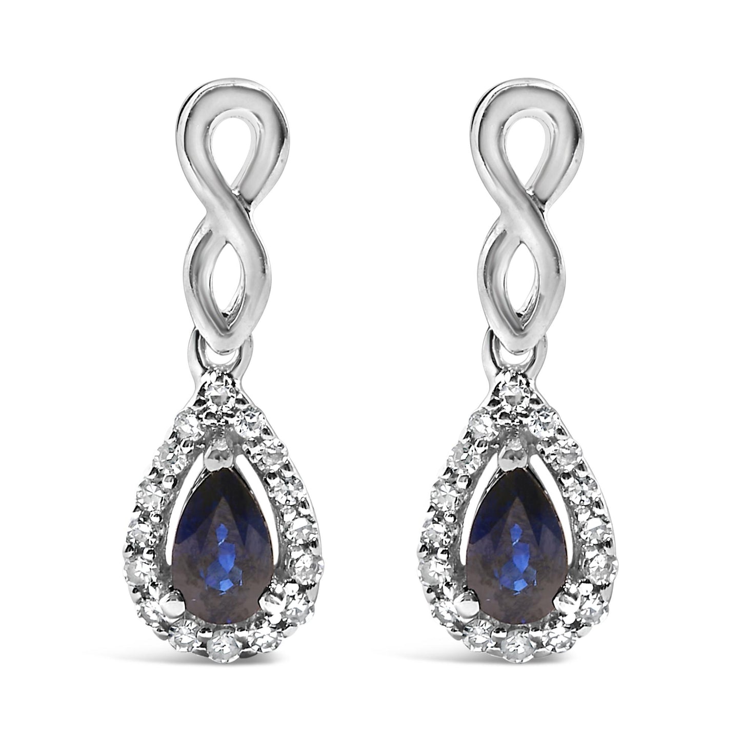 Front view of white metal infinity-shaped drop earrings with pear-shaped blue gemstones surrounded by a halo of small round white gemstones.
