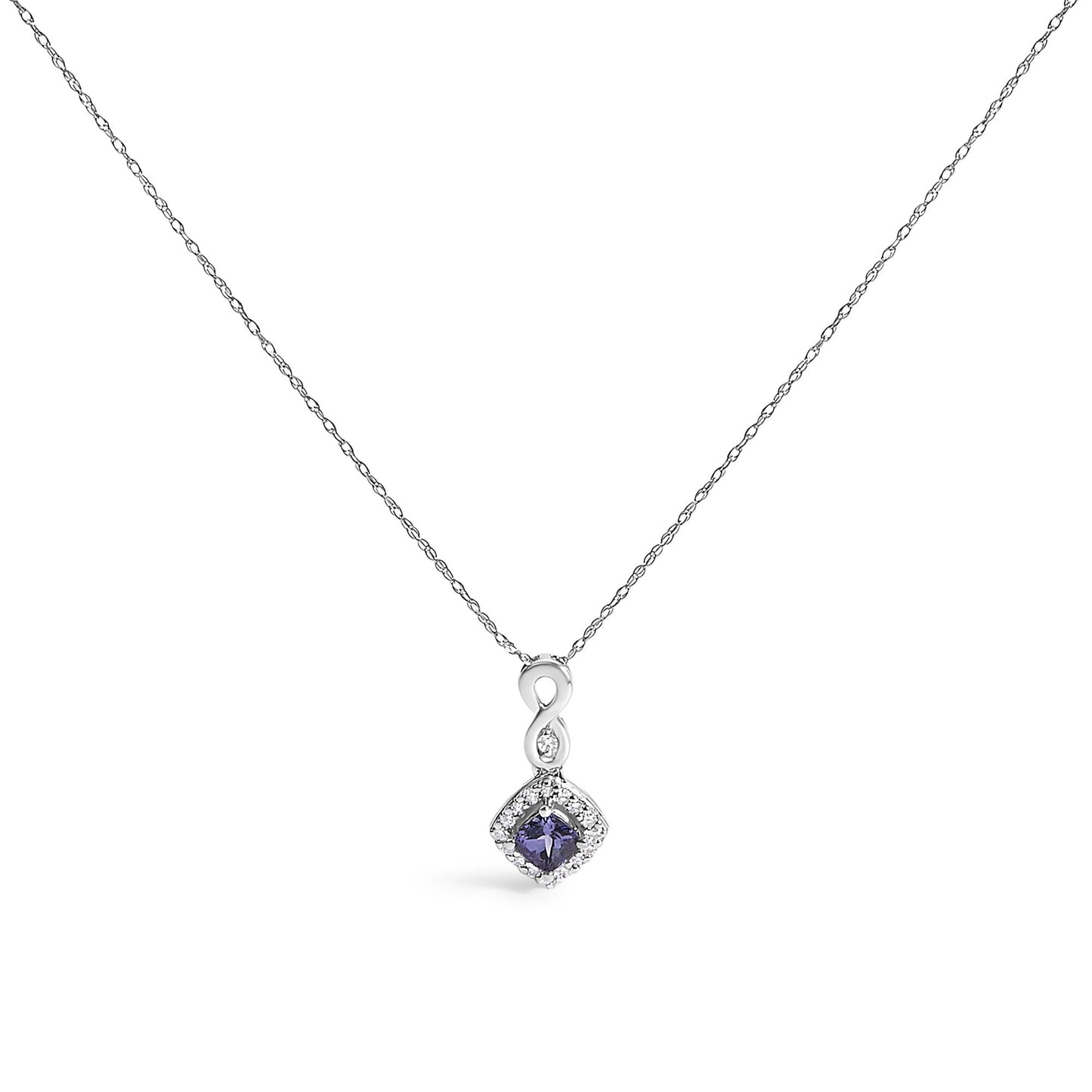 White metal necklace with a pendant featuring an infinity shape above a cushion-shaped blue gemstone surrounded by small round white gemstones, shown from the front.