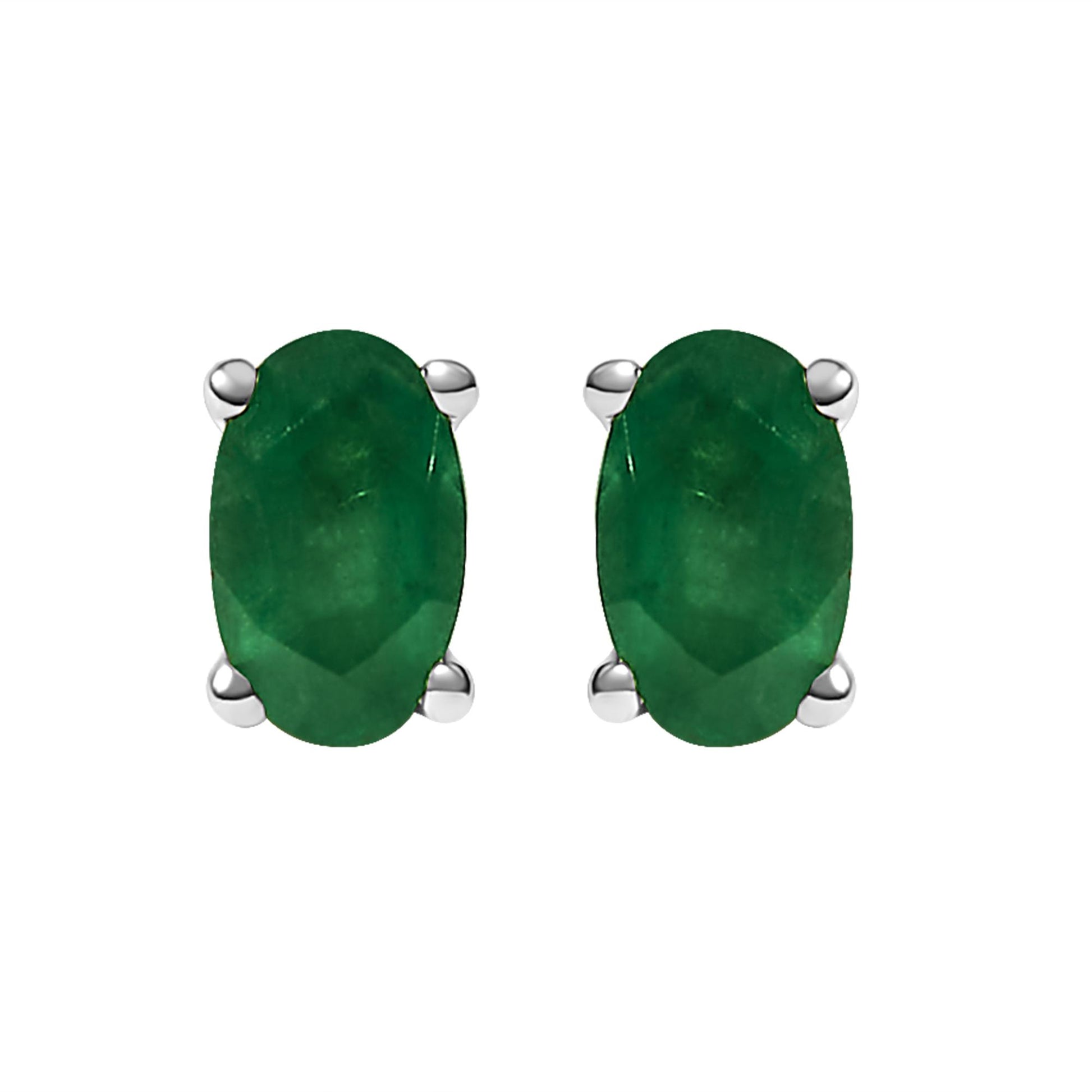 Front view of white metal stud earrings each featuring an oval-shaped green gemstone in prong setting.