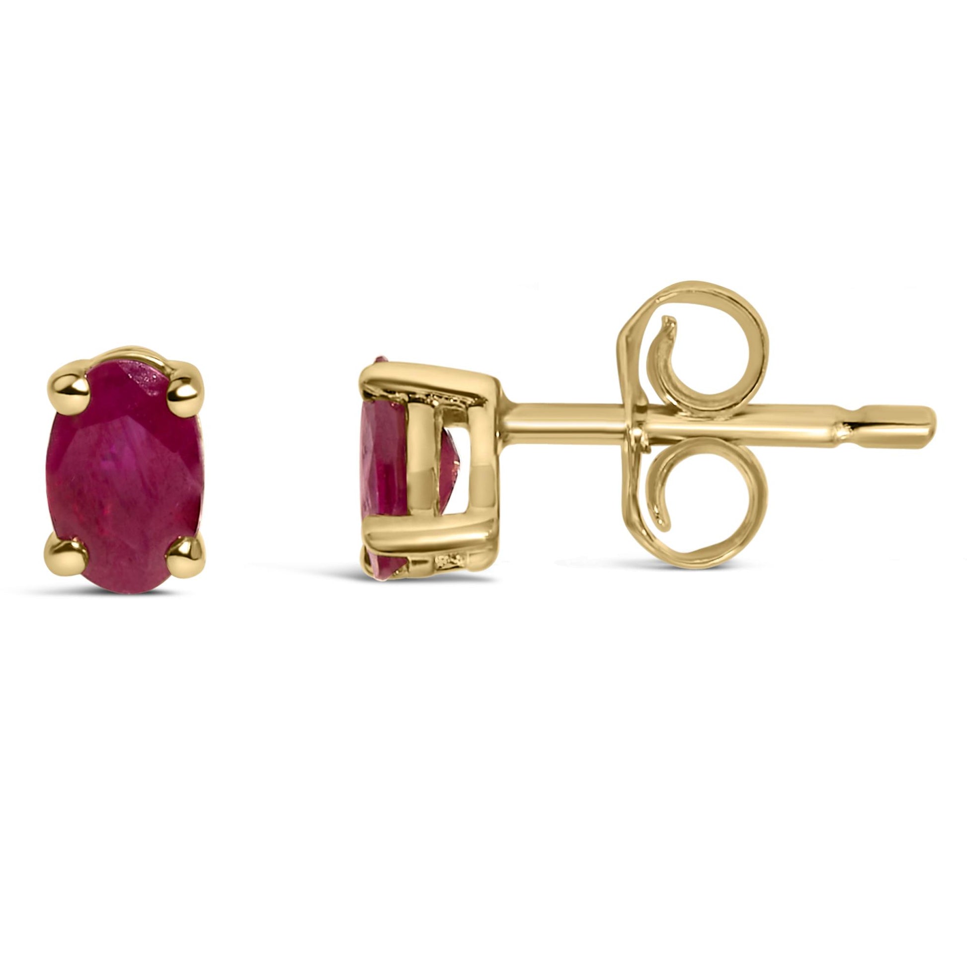 Close-up front and side view of a pair of yellow metal stud earrings with oval red gemstones in prong settings.
