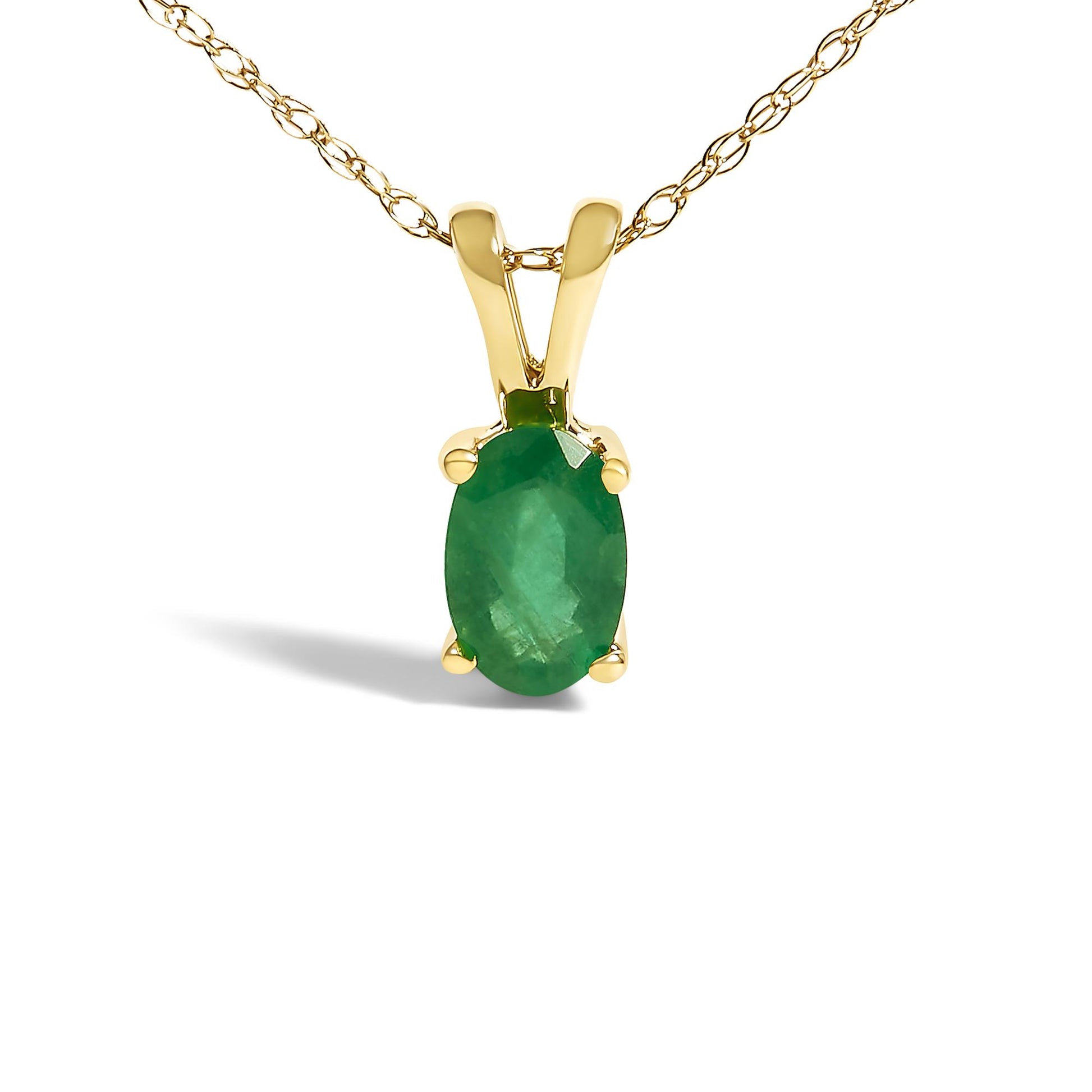 Close-up front view of a yellow necklace with an oval green gemstone in a four-prong setting, shown against a white background.
