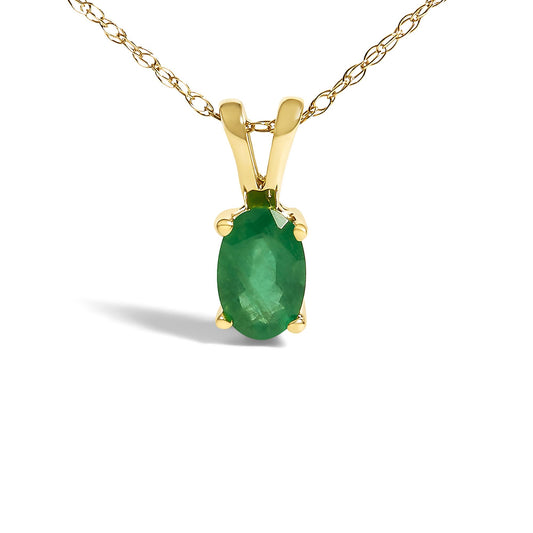 Close-up front view of a yellow necklace with an oval green gemstone in a four-prong setting, shown against a white background.