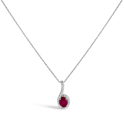 White necklace with a curved pendant featuring an oval red gemstone surrounded by round white gemstones, shown in a front-facing view.
