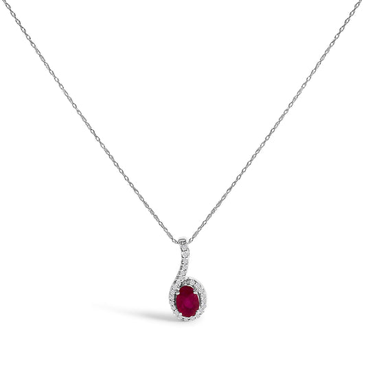 White necklace with a curved pendant featuring an oval red gemstone surrounded by round white gemstones, shown in a front-facing view.