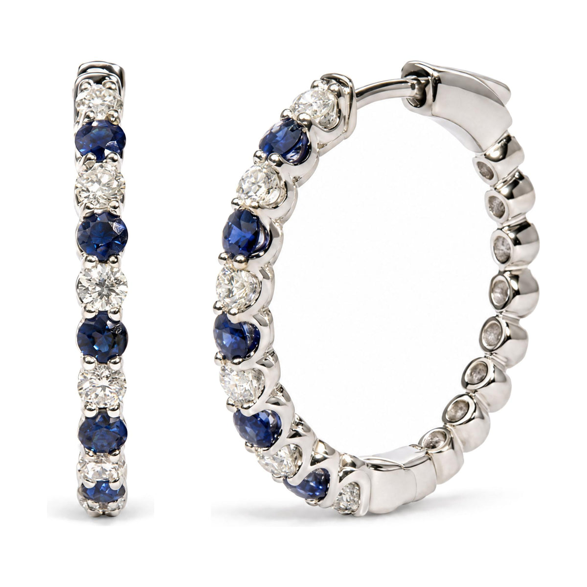 Close-up front and side angle of a single white hoop earring featuring alternating round white and blue gemstones in prong settings.