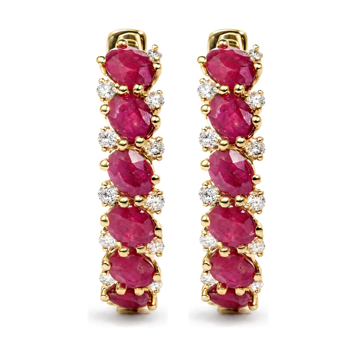 Close-up front view of a pair of yellow metal earrings featuring oval red gemstones and round white gemstones in prong settings.