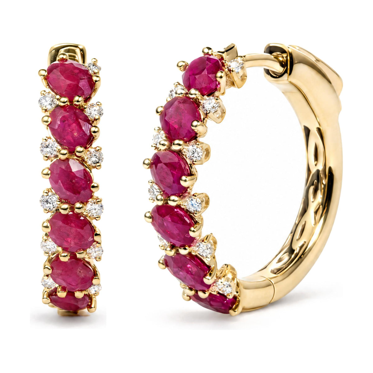 Close-up front angle of yellow metal hoop earrings adorned with oval red gemstones and round white gemstones in prong settings.