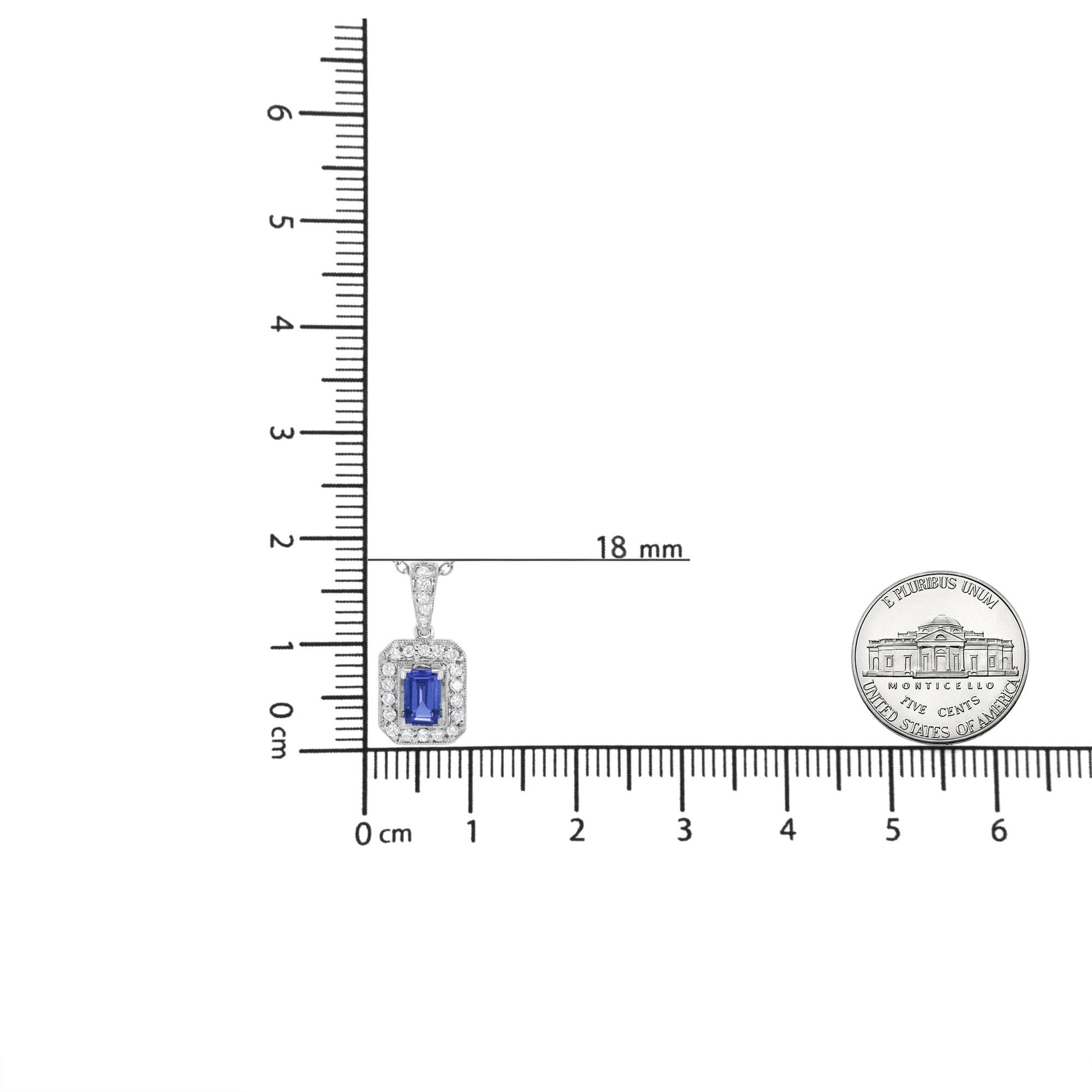 White necklace pendant with a rectangular purple gemstone surrounded by small white gemstones in a pave setting, shown on a ruler for size reference from a front angle.