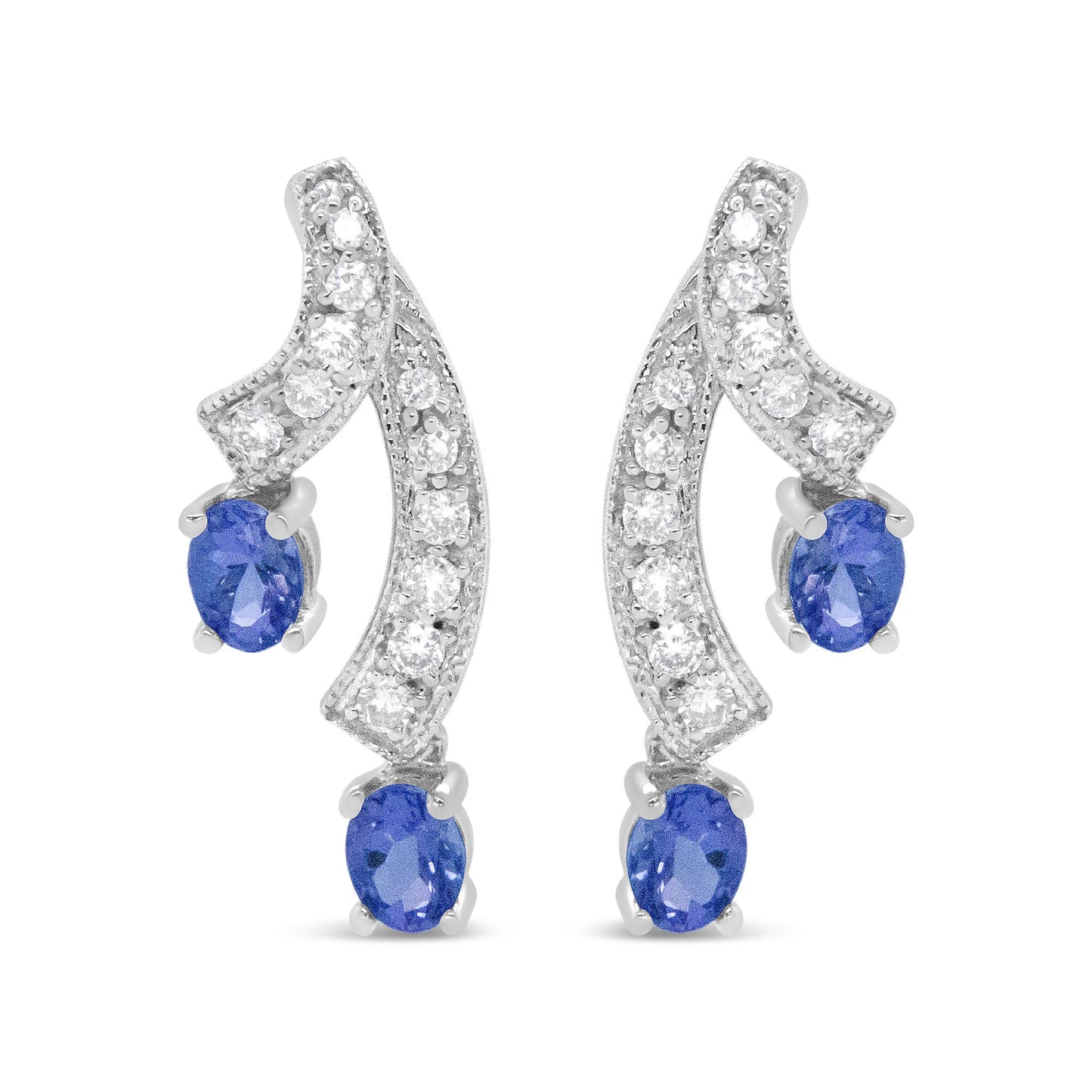 Pair of white metal earrings with curved design, prong-set with round white gemstones along the curves and blue oval gemstones at the ends, shown in a front-facing view.