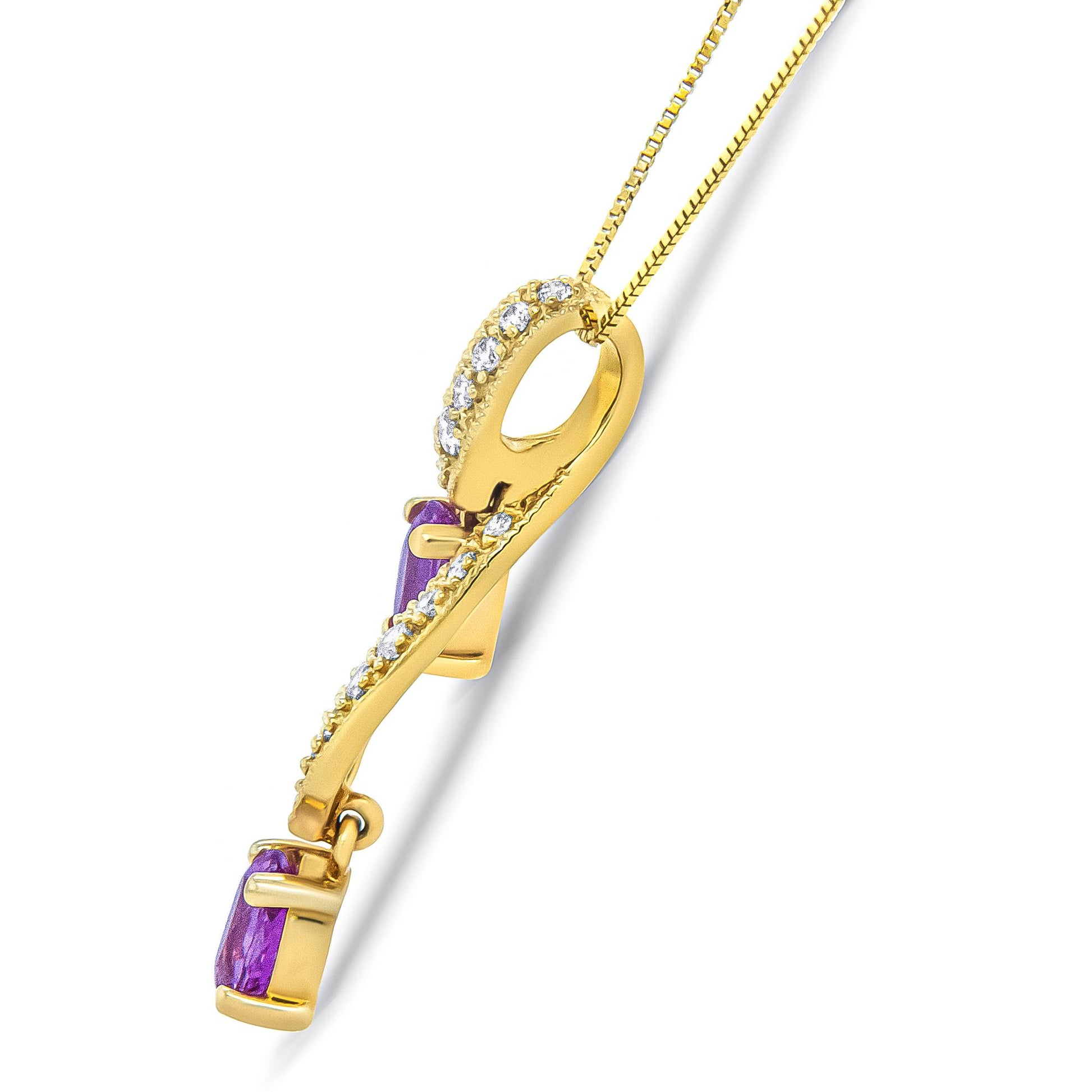 Side angle close-up of a yellow metal necklace pendant featuring two pink oval gemstones and several small white round gemstones in prong settings along a curving design, with the pendant hanging from a yellow metal chain.