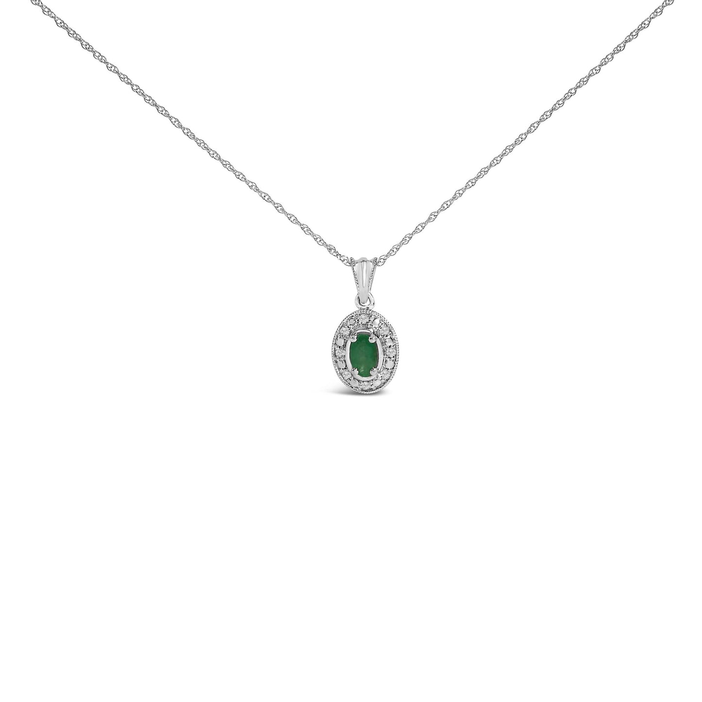 White necklace with an oval green gemstone pendant surrounded by small white gemstones in a pave setting, shown in a front-facing angle on a white background.