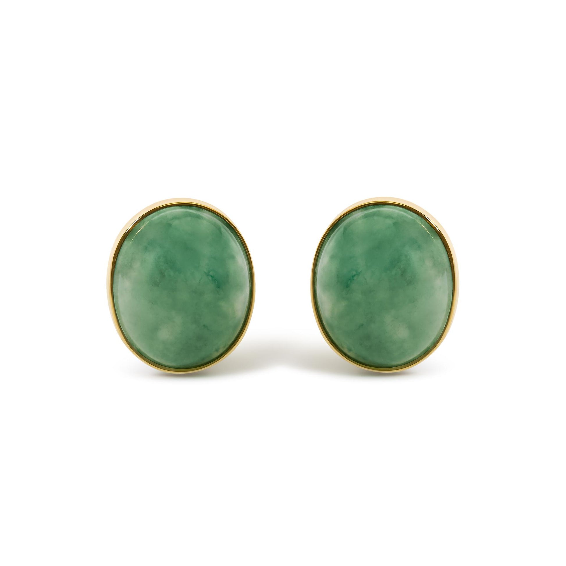 Pair of oval green gemstone bezel-set yellow metal earrings shown in a front close-up view.