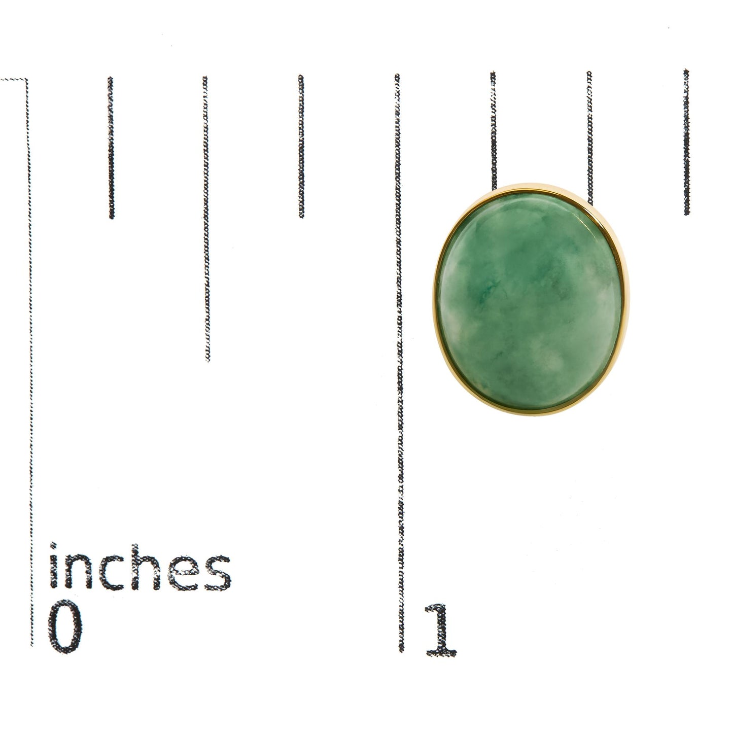 Close-up color image showing one oval-shaped green gemstone in a bezel setting on a yellow metal earring, positioned on a measuring scale.