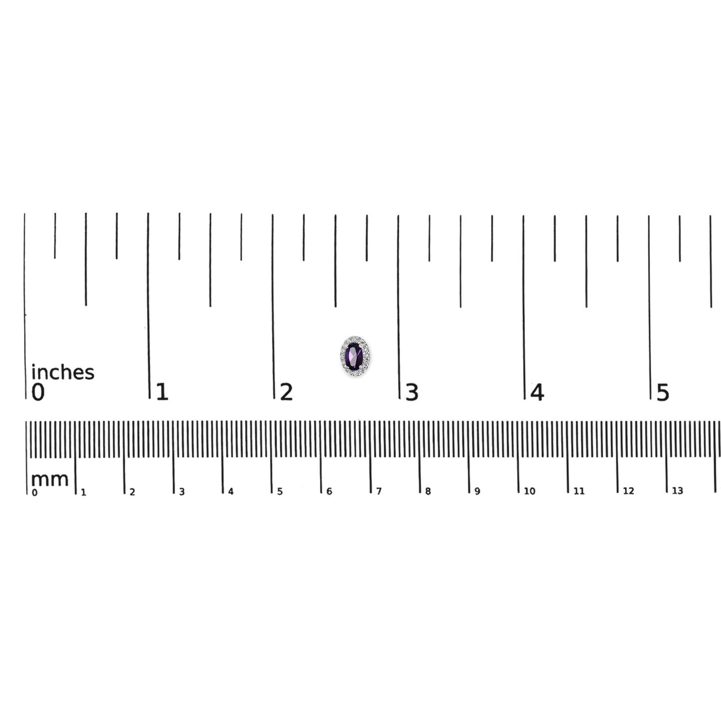 Oval-shaped purple gemstone earring with surrounding white gemstones in pave setting, shown on a ruler for size reference, top-down angle.