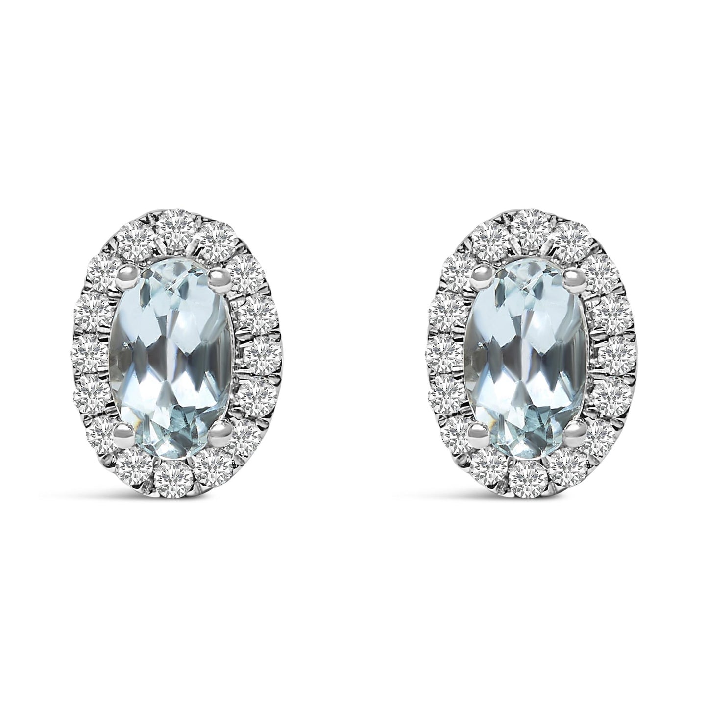 Front view of a pair of white metal oval earrings with a central blue oval gemstone surrounded by round white gemstones in a pave setting.