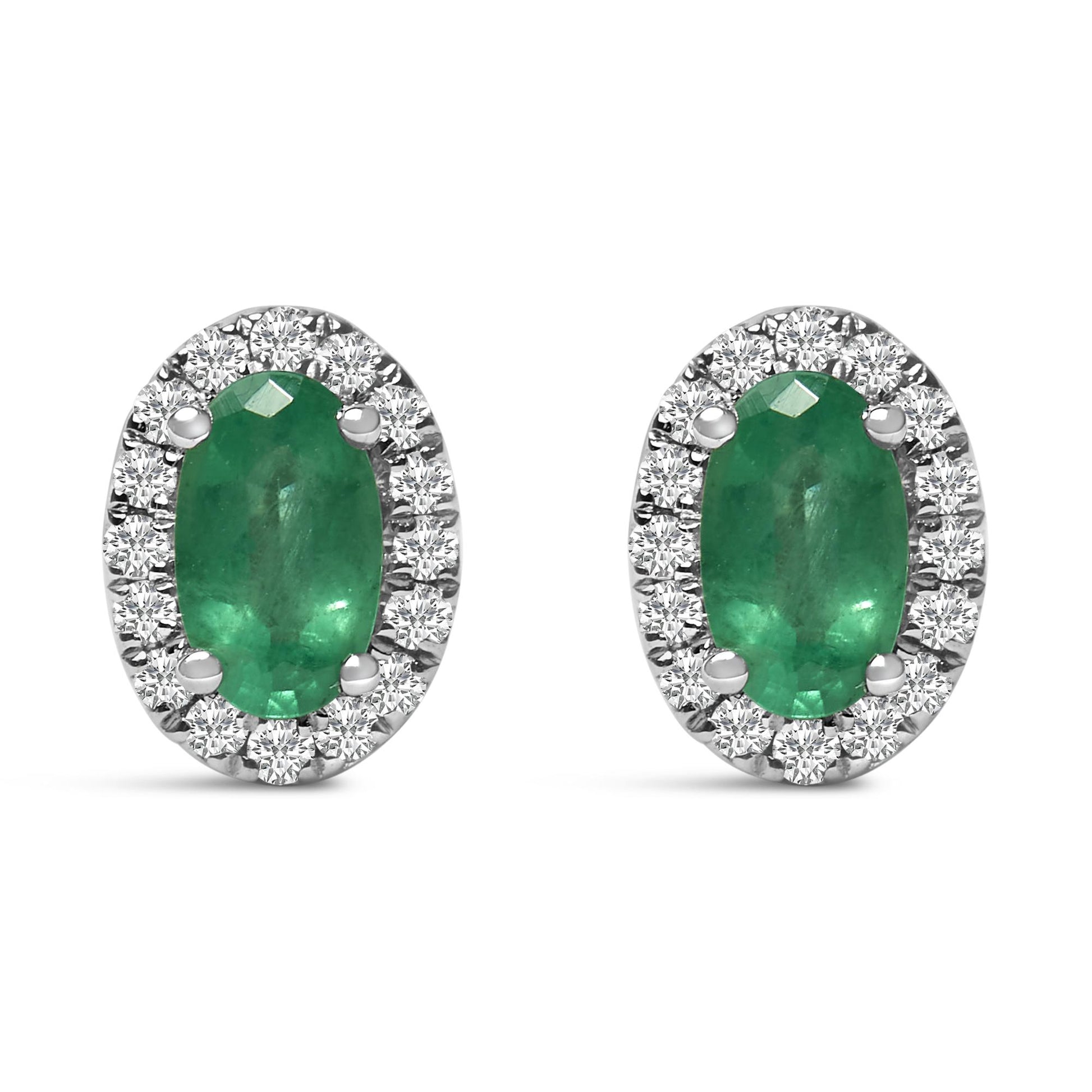 Front view of white metal oval earrings featuring a green oval gemstone surrounded by a halo of round white gemstones in pave setting.