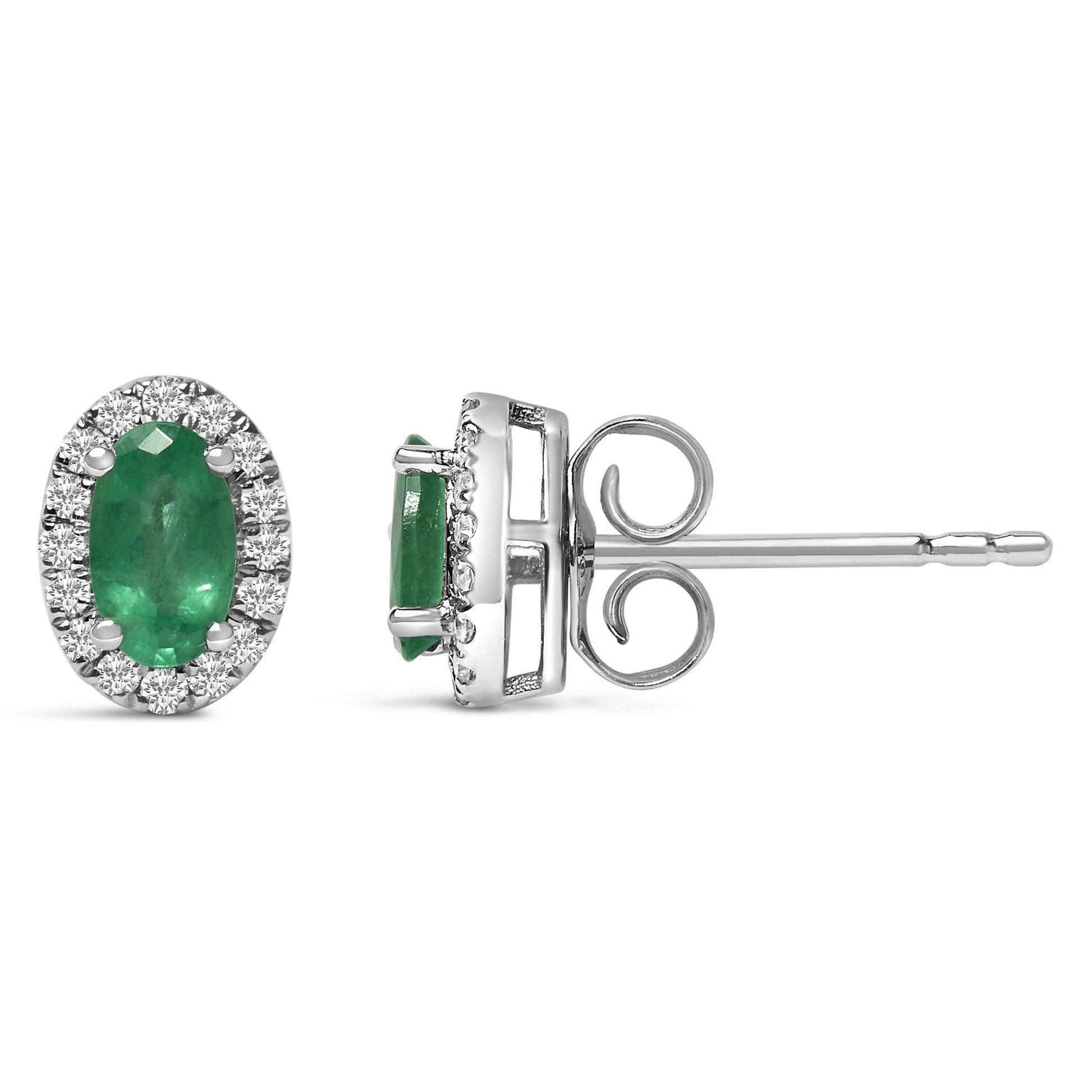 Pair of white metal stud earrings with oval green gemstones in center, surrounded by round white gemstones in pave setting, shown from front and side angles.