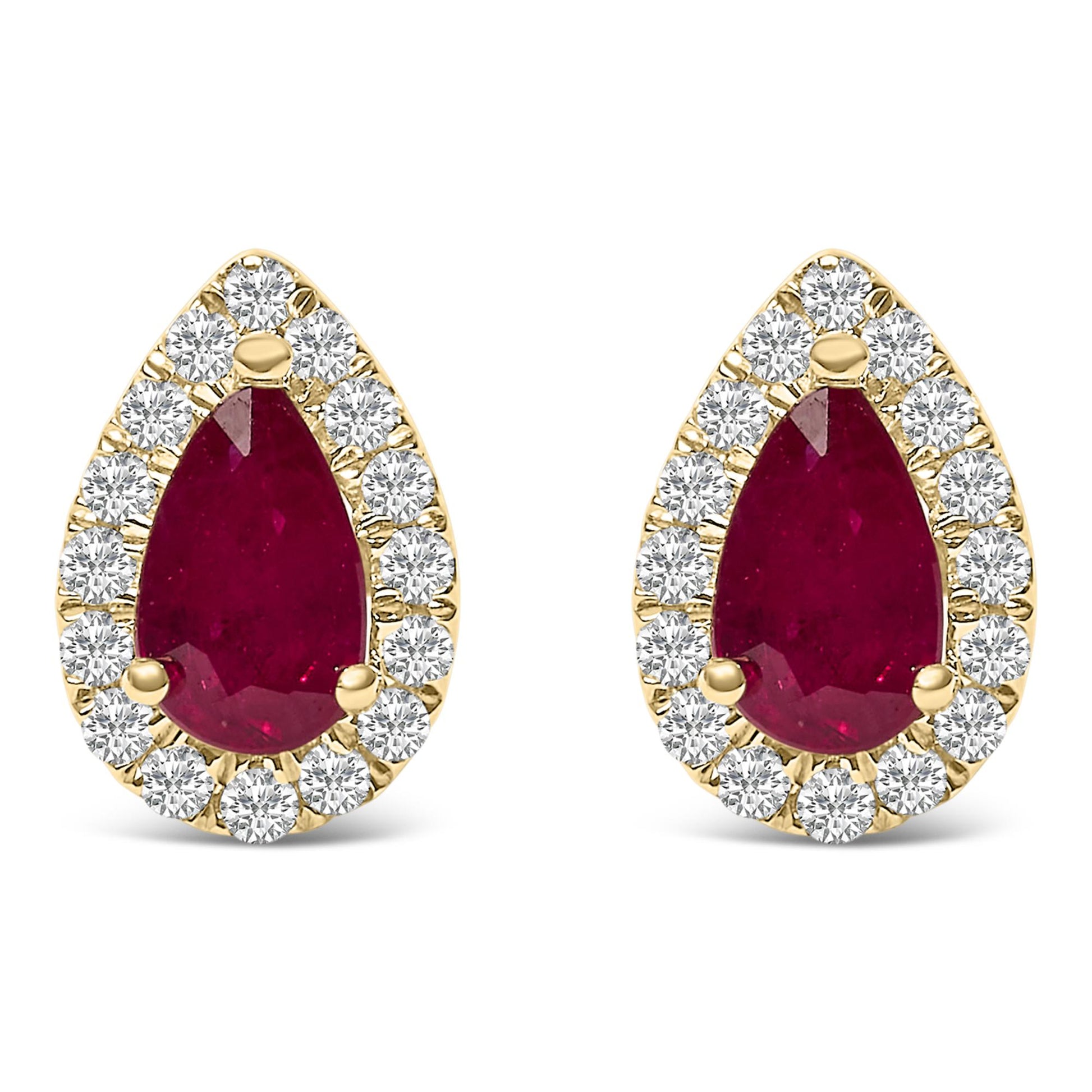 Pair of yellow metal earrings with pear-shaped red gemstones in the center surrounded by small round white gemstones, shown from the front angle.