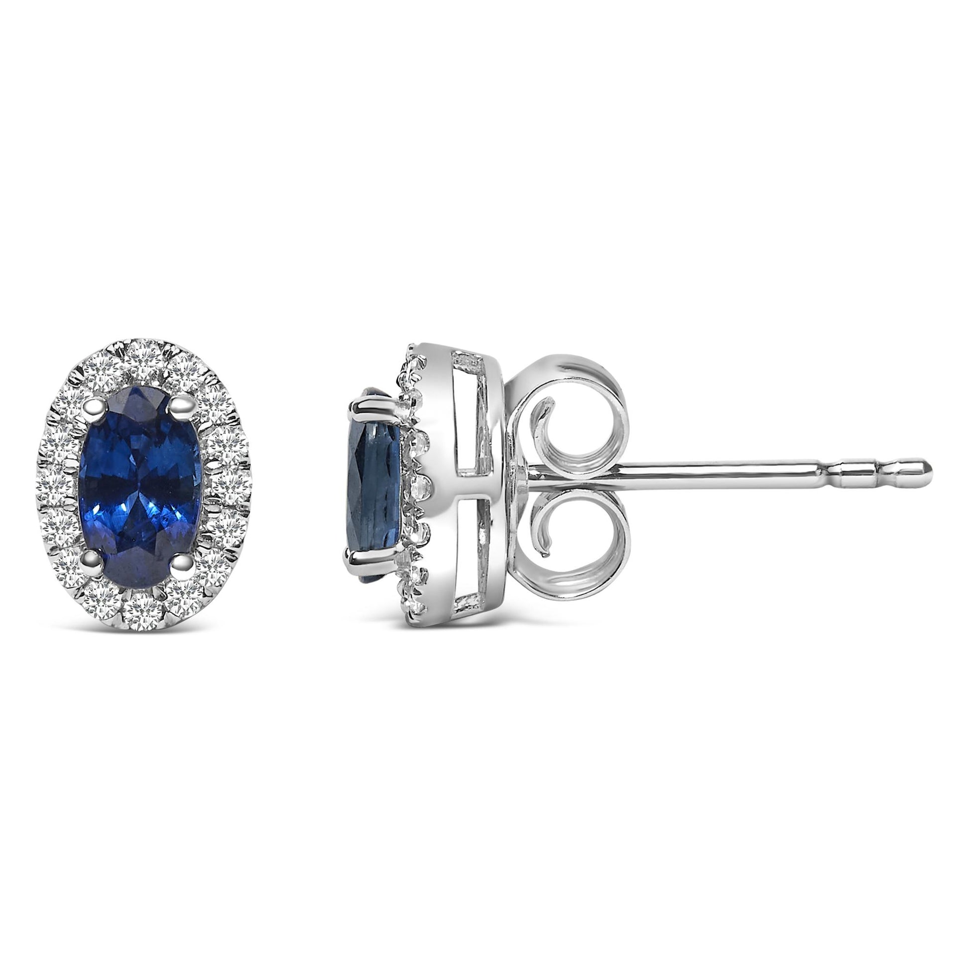 Pair of white stud earrings shown from front and side angles, each featuring an oval blue gemstone surrounded by round white gemstones in a pave setting.