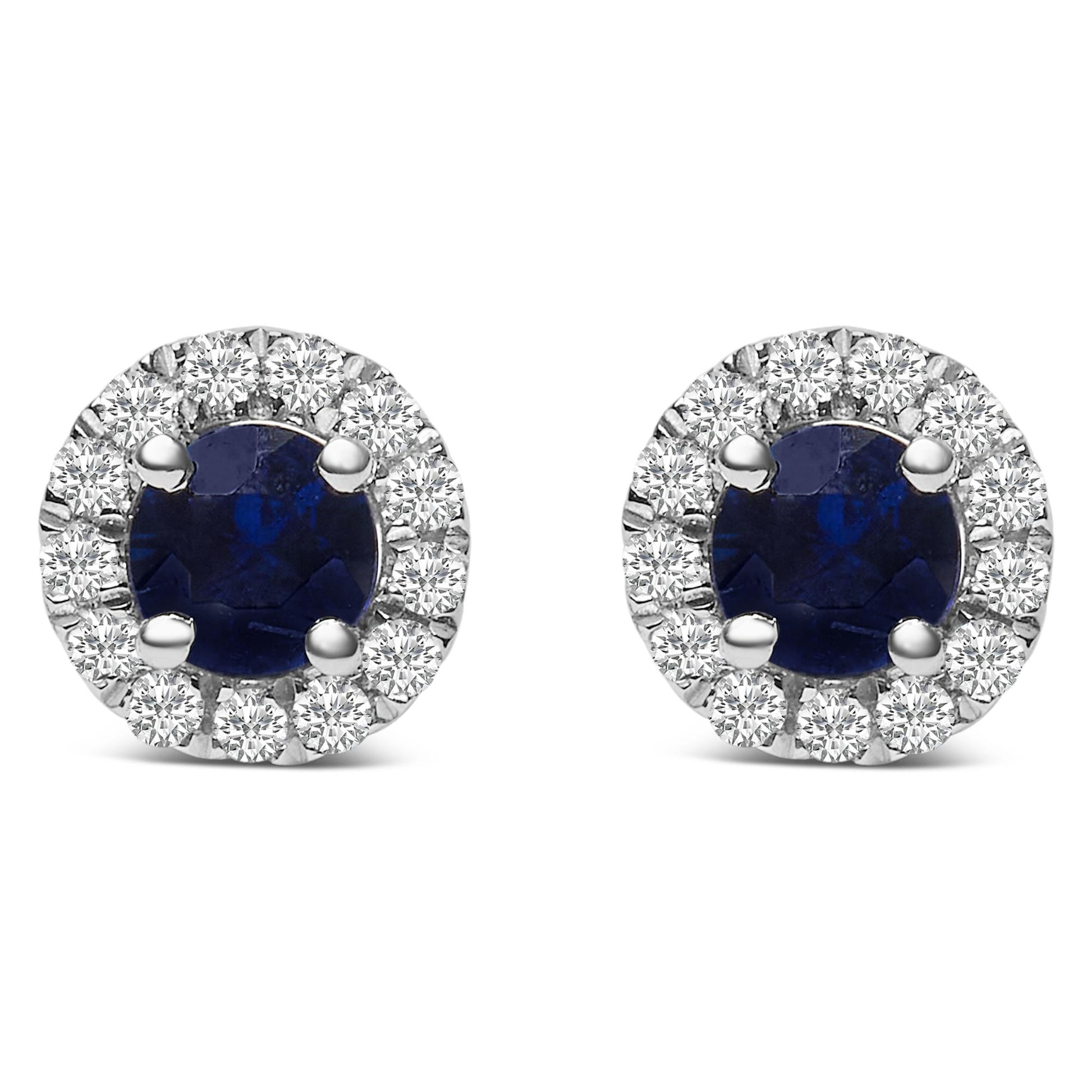 Front view of white metal round stud earrings featuring a central round blue gemstone with surrounding round white gemstones in a pave setting.