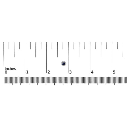Close-up front view of white metal round stud earring with a blue gemstone center surrounded by small white gemstones, placed on a ruler for size reference.