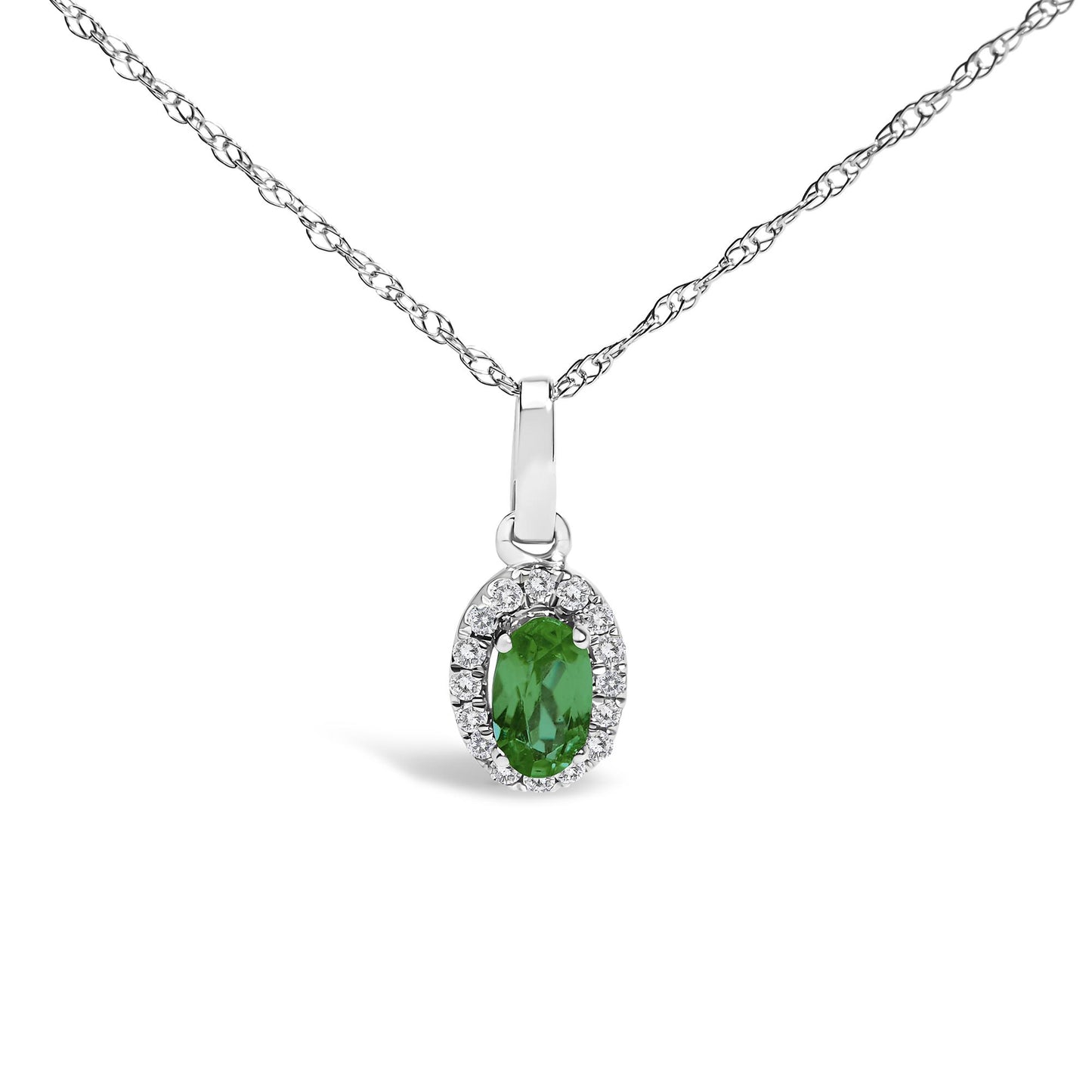 White metal necklace with a pendant featuring an oval green gemstone surrounded by round white gemstones, shown from the front.
