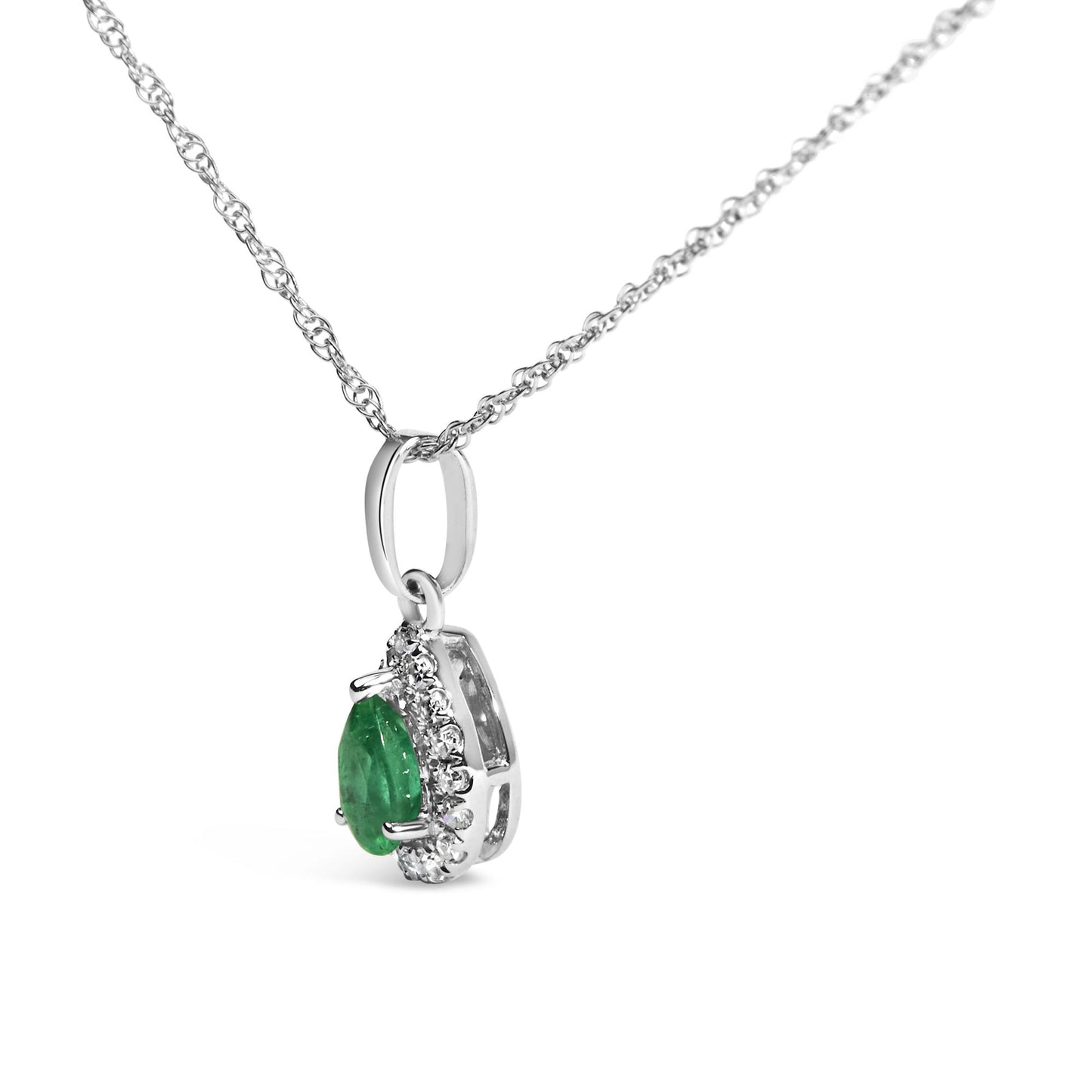 Close-up side angle of a white metal necklace with a pear-shaped green gemstone pendant surrounded by small white gemstones in a micro-pave setting.