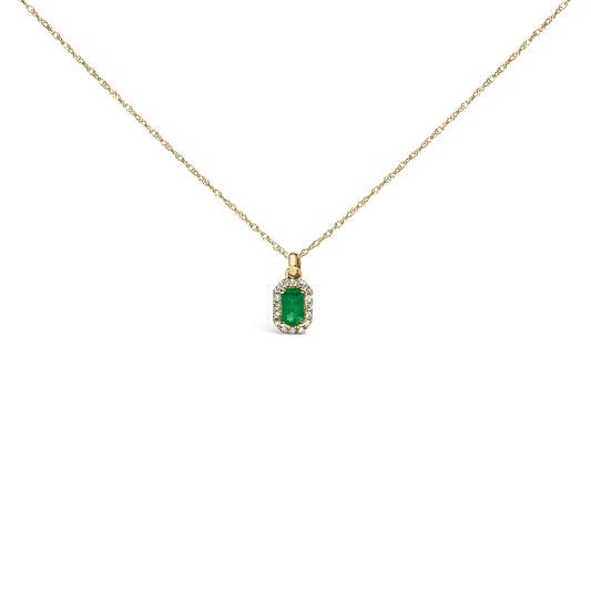 Front view of a yellow necklace with a rectangular green gemstone pendant surrounded by small round white gemstones.