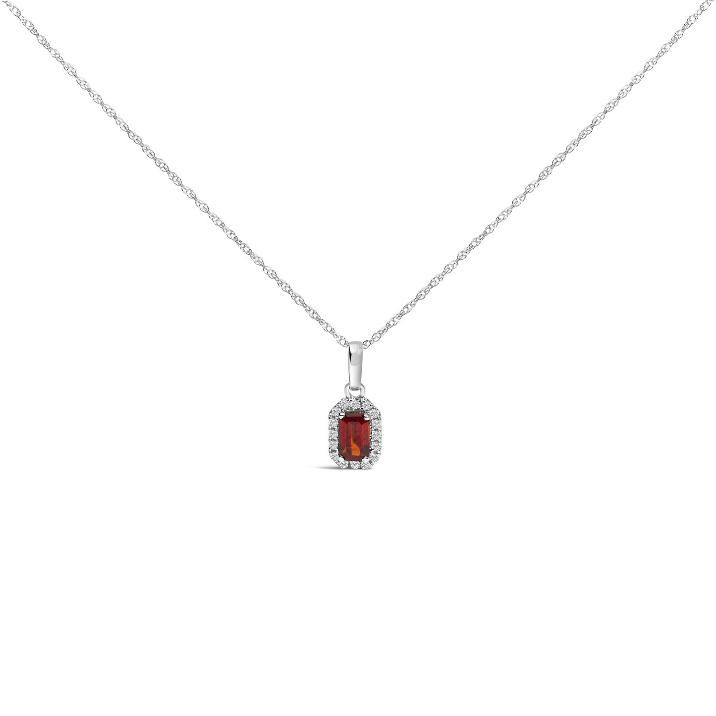 Front view of a white metal necklace with a pendant featuring a rectangular red gemstone surrounded by small white gemstones.