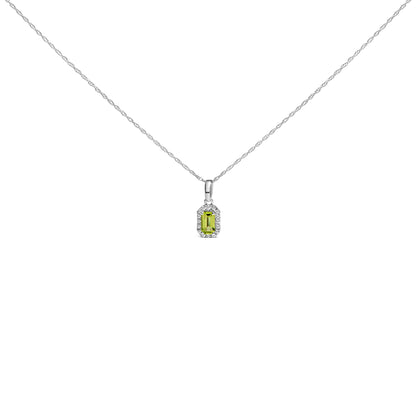 Front view of a white necklace with a pendant featuring a yellow emerald-shaped gemstone surrounded by small round white gemstones in a micro-pave setting.