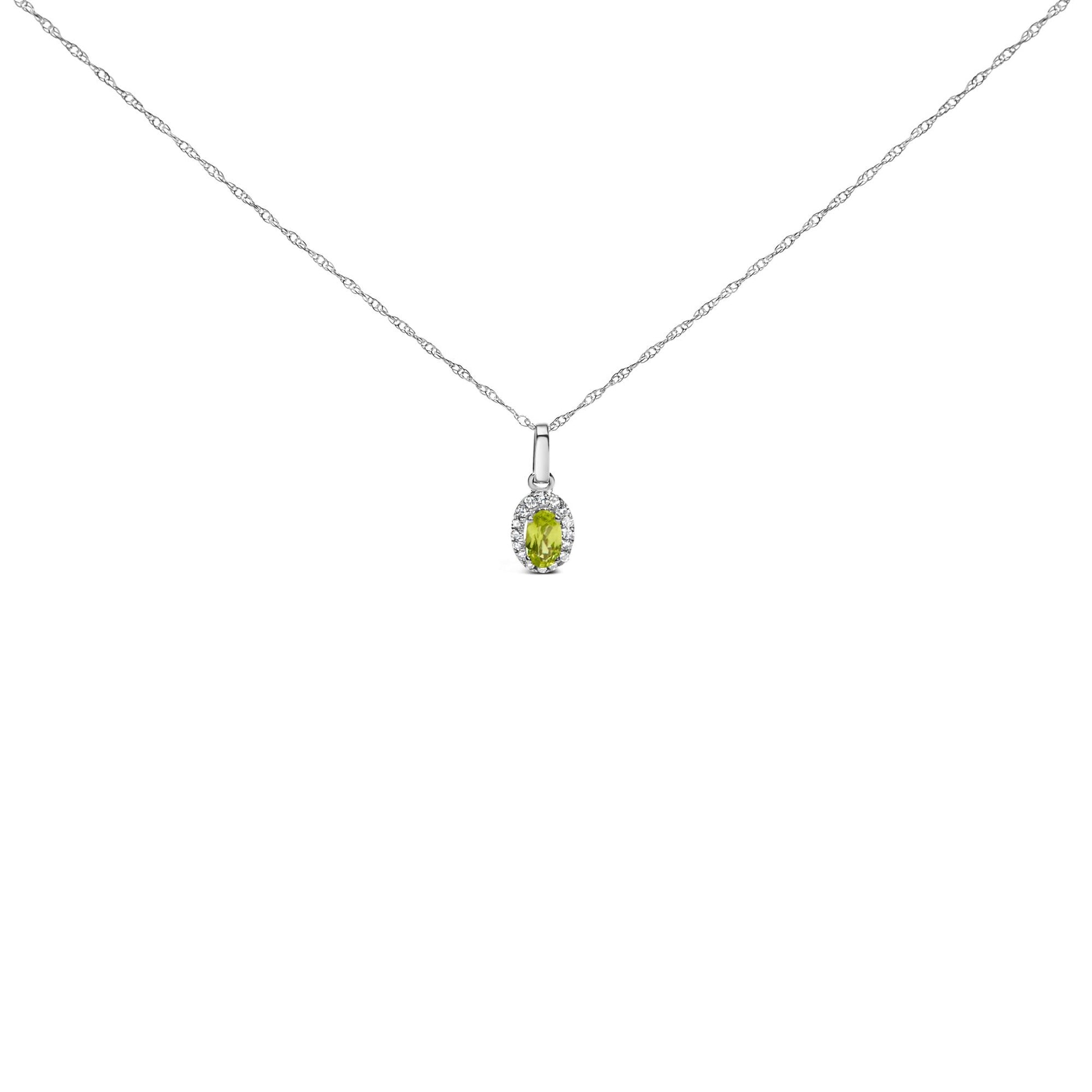 Front-facing shot of a white necklace with a small oval yellow gemstone pendant surrounded by round white gemstones.