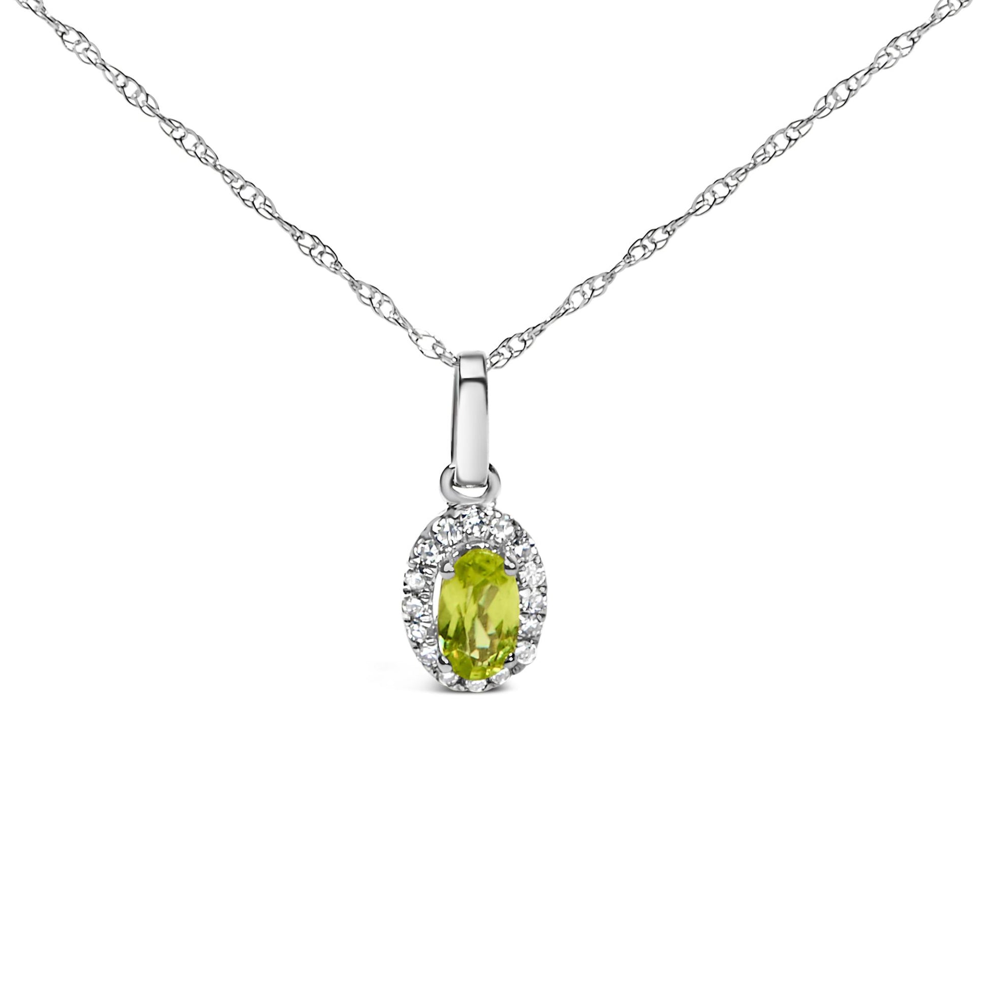 Front view of a white metal necklace with an oval yellow gemstone pendant surrounded by small round white gemstones in a micro-pave setting.