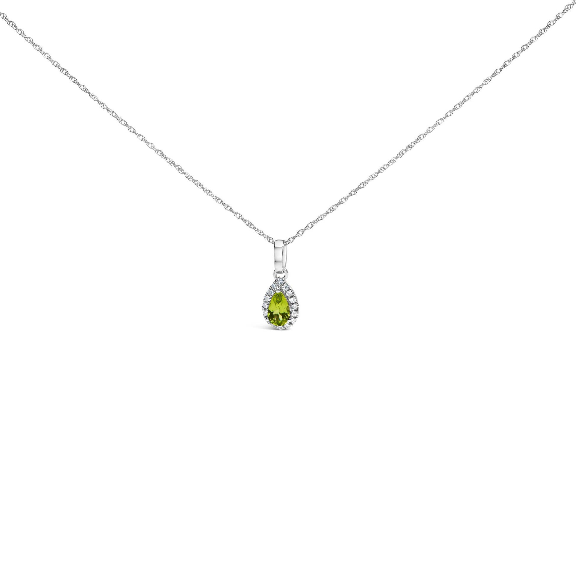 Front-facing shot of a white metal necklace featuring a pear-shaped yellow gemstone pendant surrounded by small round white gemstones in a micro-pave setting.
