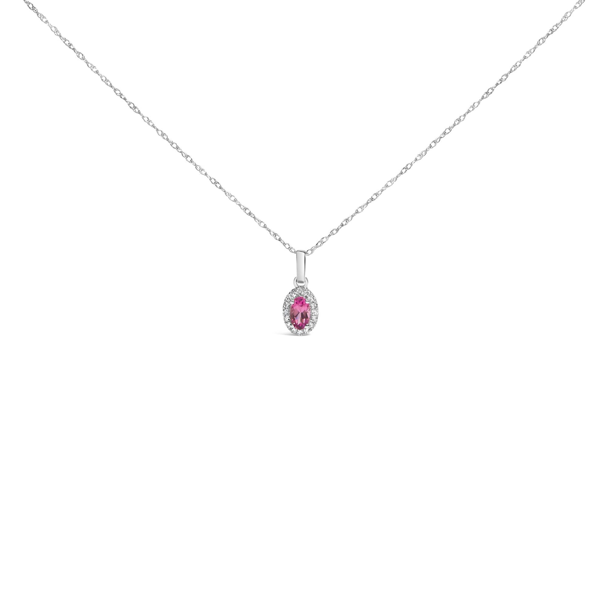 Front view of a white metal necklace with a small pendant featuring a pink pear-shaped gemstone surrounded by round white gemstones in micro-pave setting.