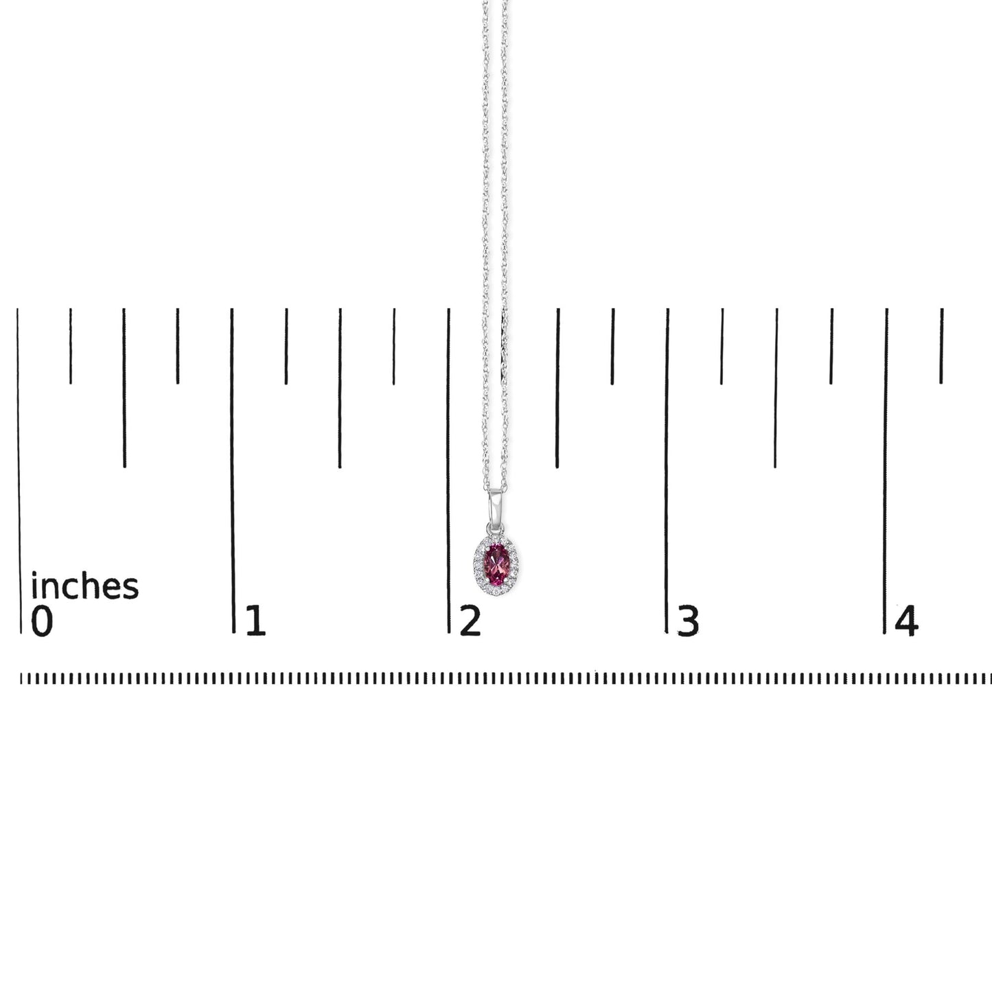 White metal necklace with an oval pendant featuring a pink pear-shaped gemstone surrounded by round white gemstones in a micro-pave setting, displayed flat on a ruler for size reference, shot from the front.