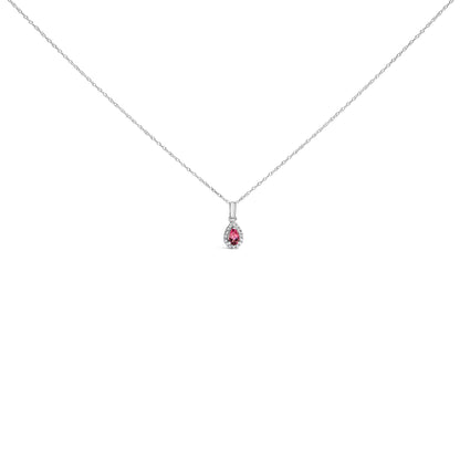 Front view of a white metal necklace with a teardrop-shaped pink gemstone pendant surrounded by small round white gemstones in micro-pave setting.
