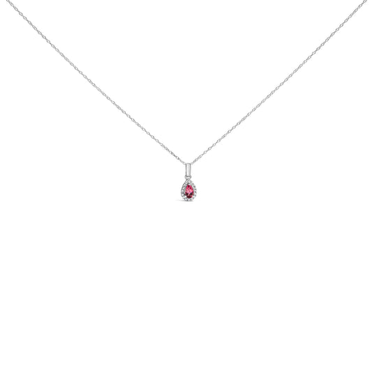 Front view of a white metal necklace with a teardrop-shaped pink gemstone pendant surrounded by small round white gemstones in micro-pave setting.