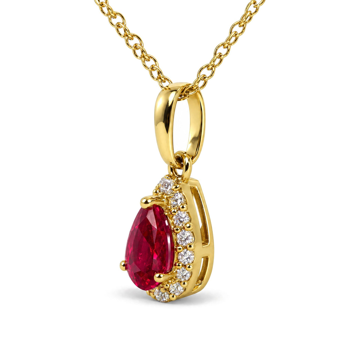 Close-up front angled view of a yellow metal necklace chain with a pendant featuring a pear-shaped red gemstone surrounded by round white gemstones in prong settings.