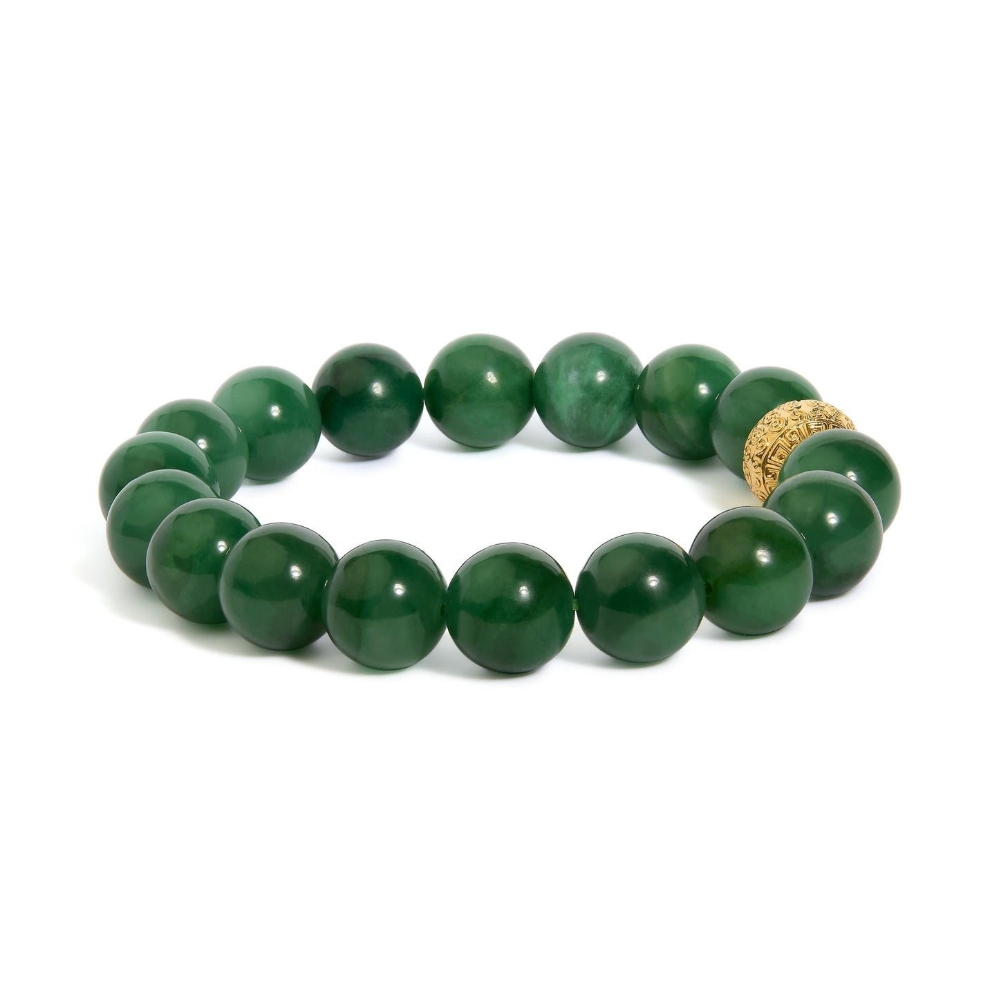 Close-up angled shot of a yellow metal bracelet featuring round green aventurine gemstones in a drilled setting.