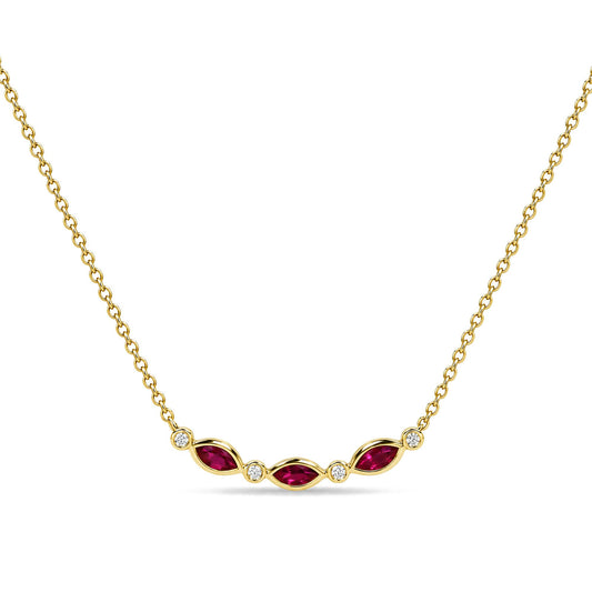 Close-up front view of a yellow metal necklace featuring alternating marquise-shaped red gemstones in prong settings and round white gemstones in bezel settings along the center.