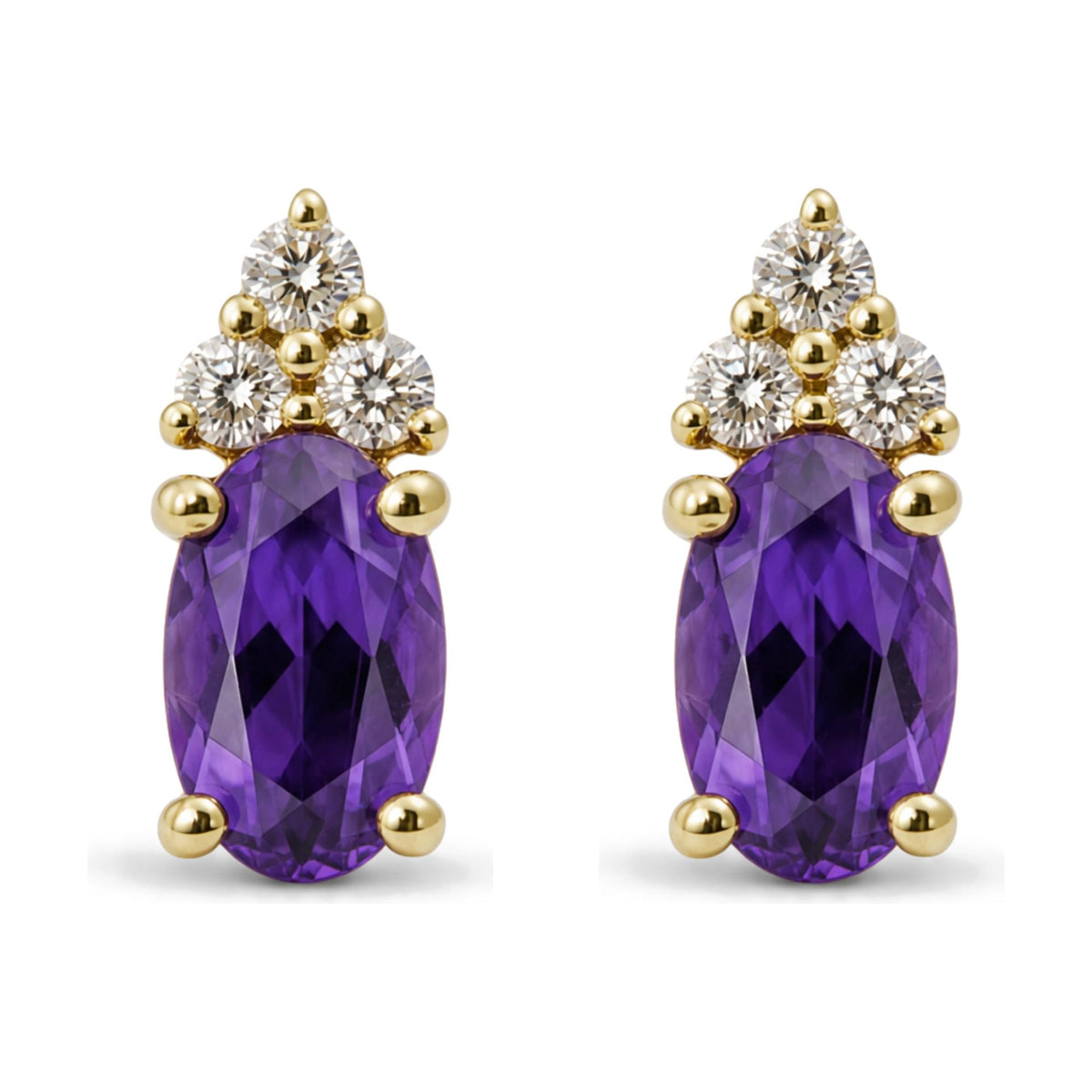 Pair of yellow metal earrings shown in close-up from the front, each featuring an oval purple gemstone with prong setting and a cluster of round white gemstones above.