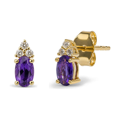 Close-up side and front angle of a yellow metal earring featuring an oval purple gemstone with a prong setting, topped with a cluster of round white gemstones in a prong setting. The earring is shown on a white background.
